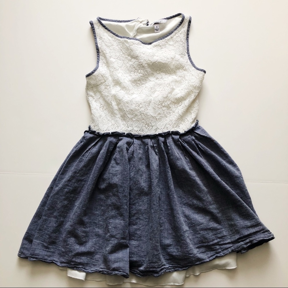 White lace detail dress with blue skirt.